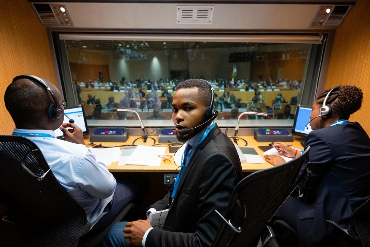 Professional interpreters working at a conference